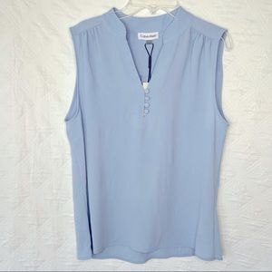 NWOT Calvin Klein V-neck blouse. Never worn but tags were removed.